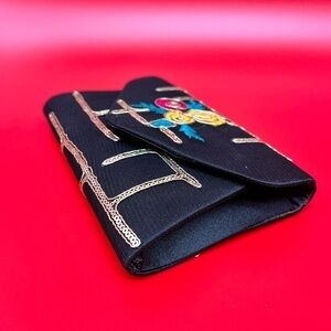 Beautiful black and multicolored clutch wallet with sequins accents